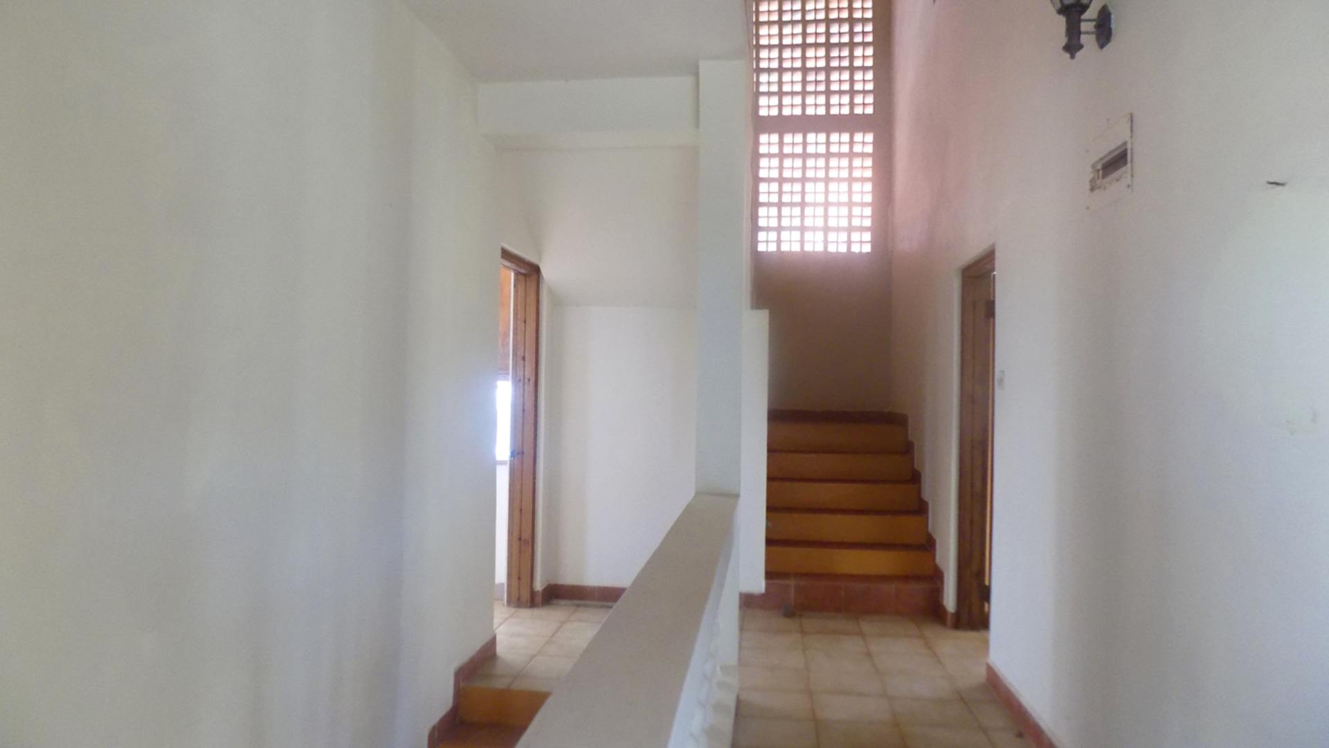 fixer upper home for sale with ocean view stair