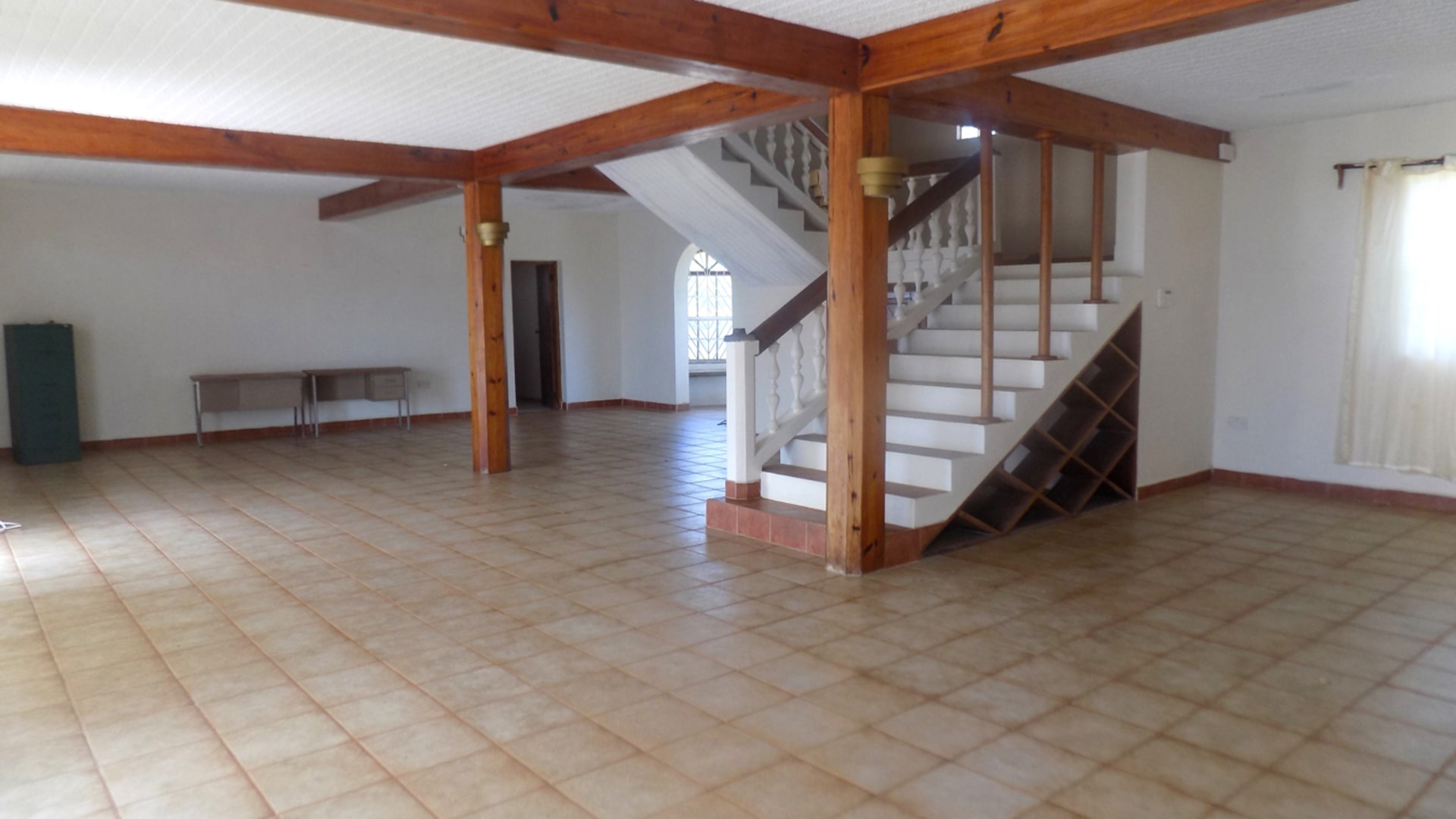 fixer upper home for sale with ocean view staircase