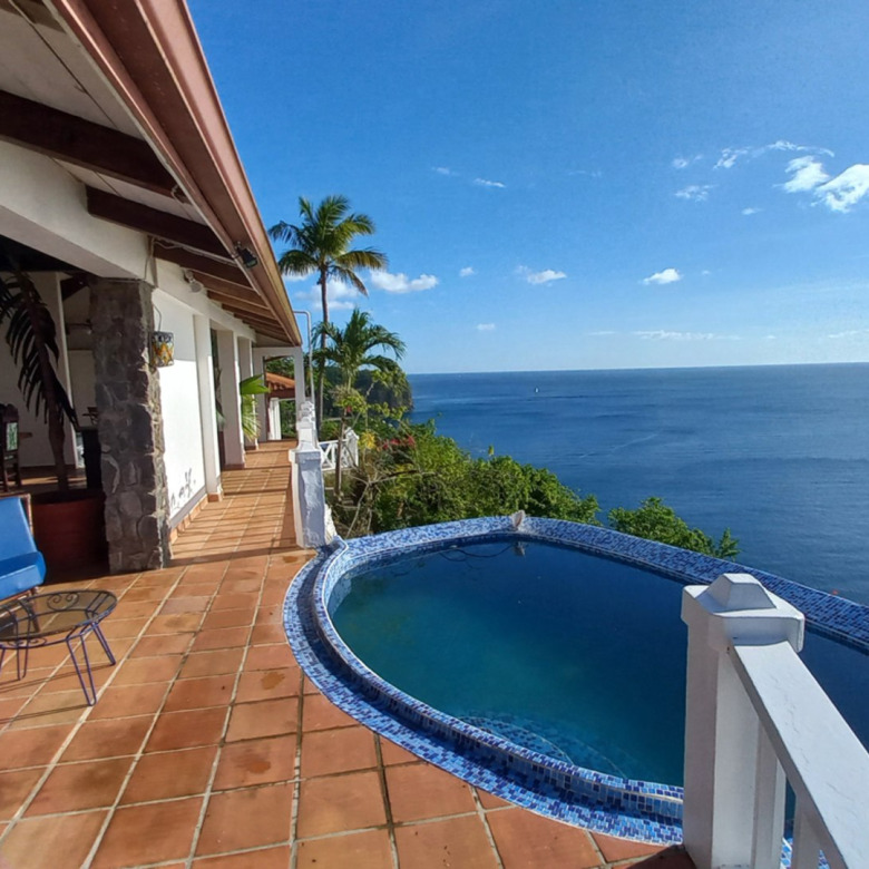 St Lucia Real Estate The Cliff House Overlooking Marigot Bay pool side