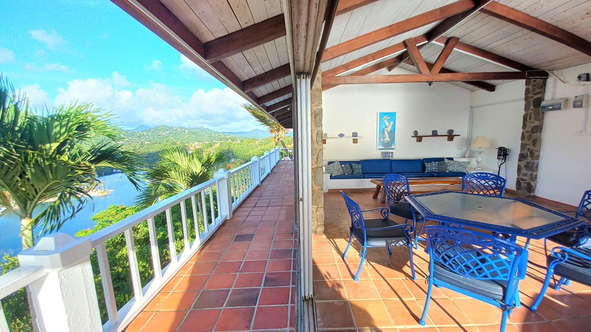 St Lucia Real Estate The Cliff House Overlooking Marigot Bay blue table