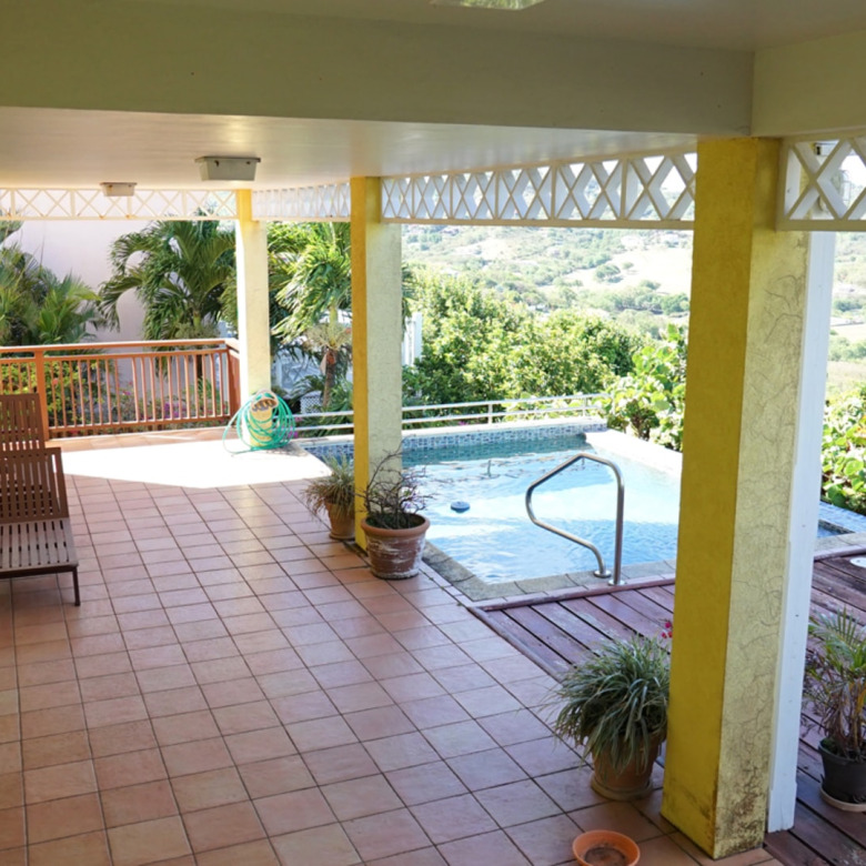 st lucia real estate villa yellow house pool