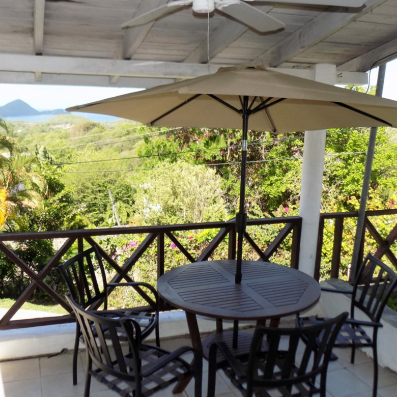 st lucia real estate 2 bedroom Cozzy Cottage For Rent at Cap Estate, St. Lucia umbrella