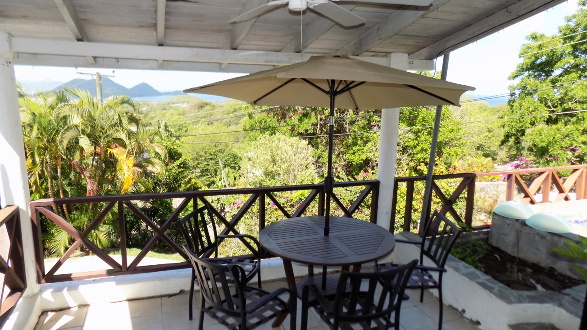 st lucia real estate 2 bedroom Cozzy Cottage For Rent at Cap Estate, St. Lucia umbrella