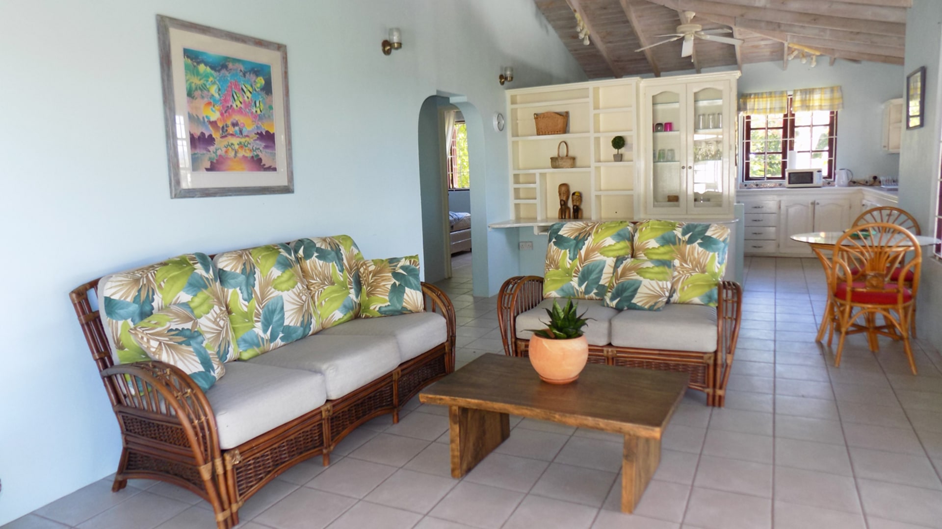 st lucia real estate 2 bedroom Cozzy Cottage For Rent at Cap Estate, St. Lucia rattan chairs