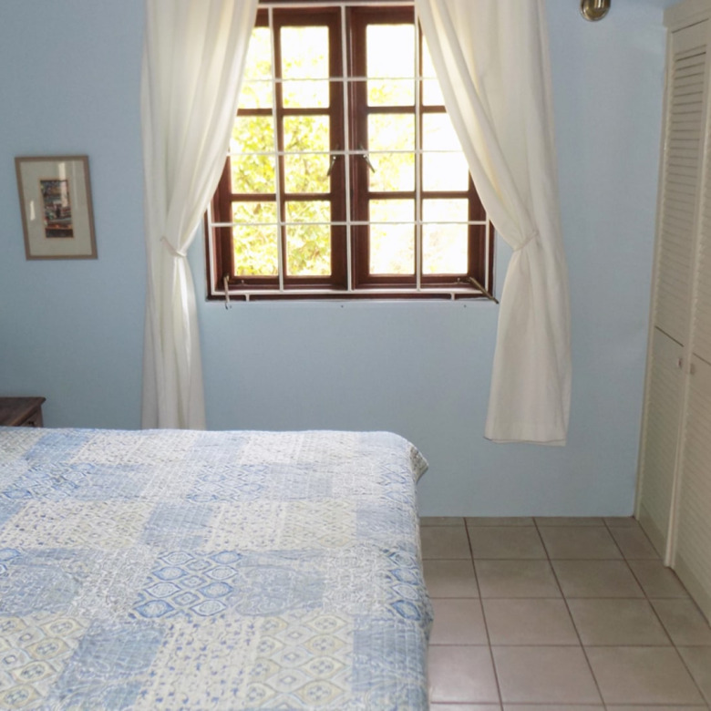 st lucia real estate 2 bedroom Cozzy Cottage For Rent at Cap Estate, St. Lucia bedroom
