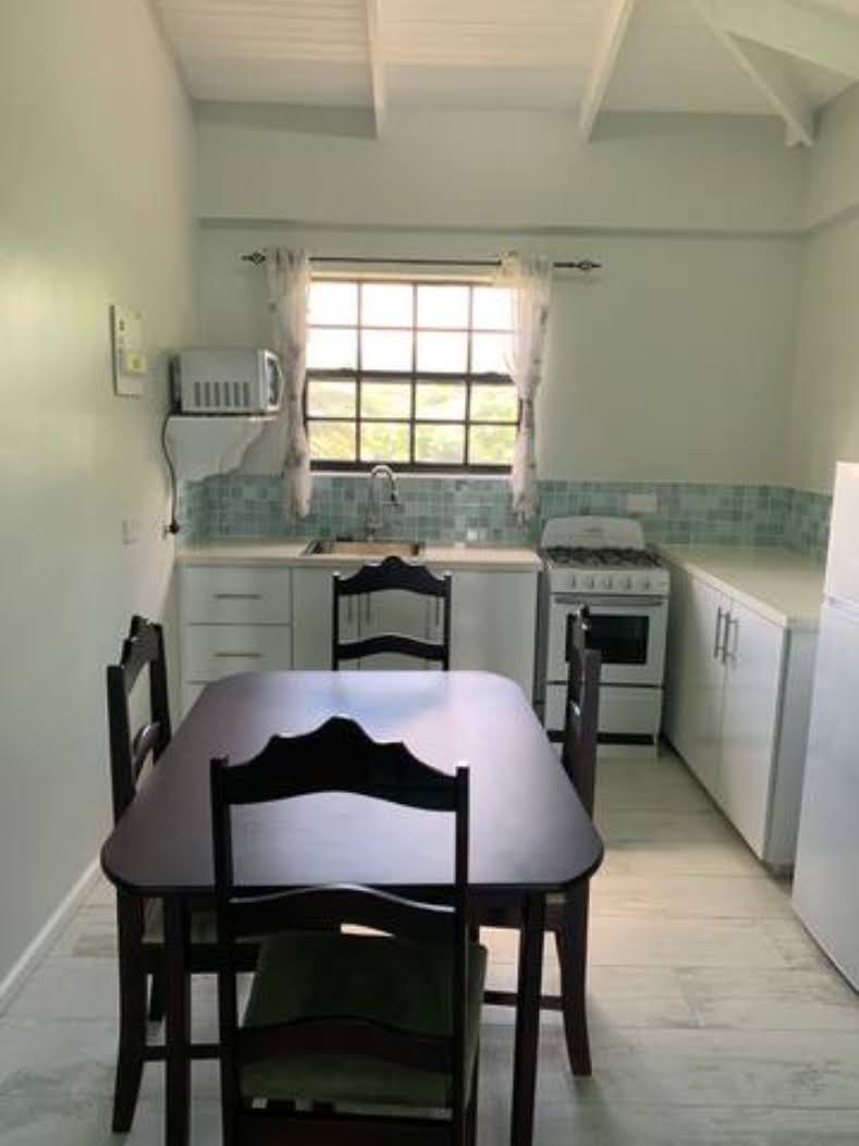 St Lucia Veronica's Breathe Easy Rental apartment #2 table