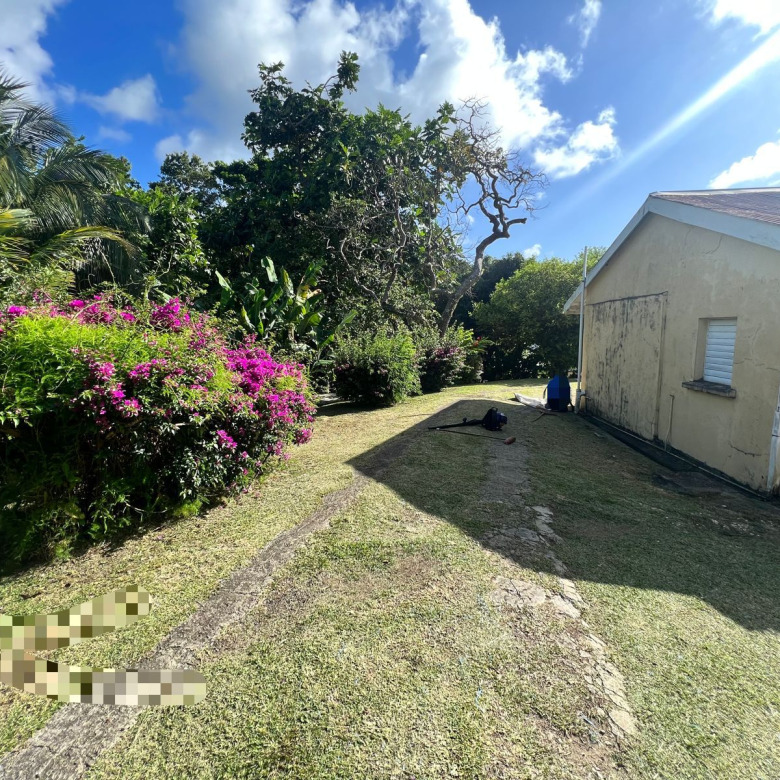 St Lucia Real estate Fixer-Upper Gem At Morne Fortune back yard
