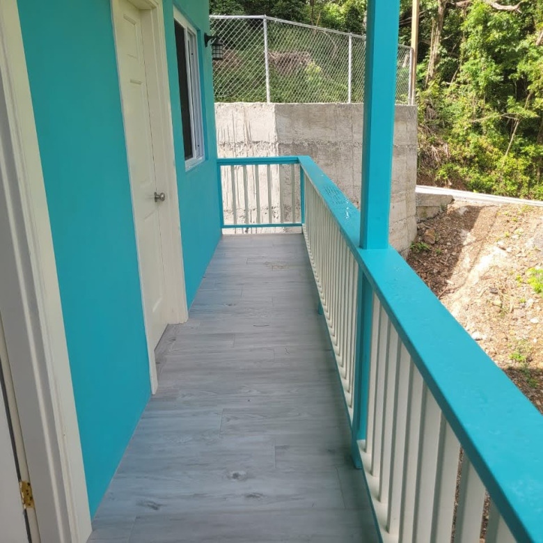 st lucia real estate House For Sale In Grand Riviere Gros Isle varandah