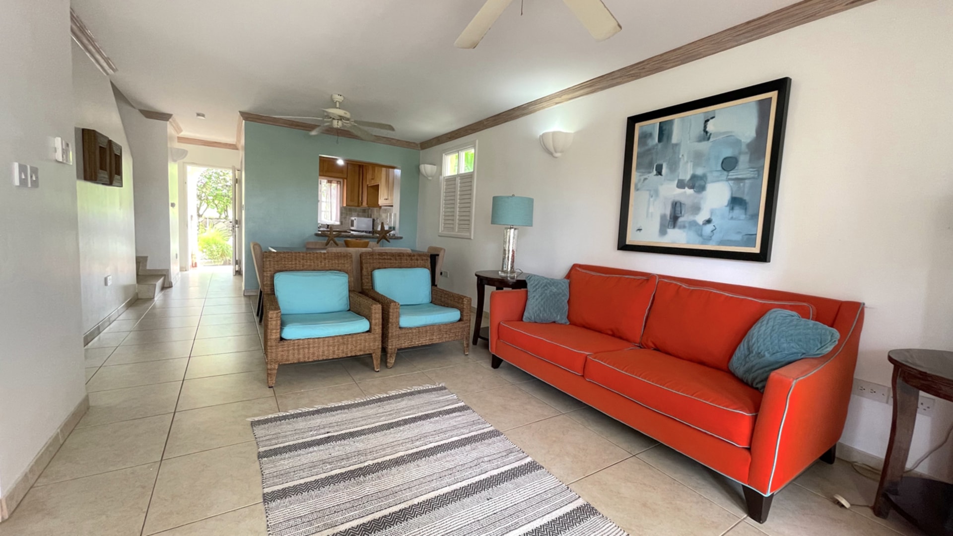 St Lucia real estate VILLAS ON THE GREEN 2 For Rent red chair