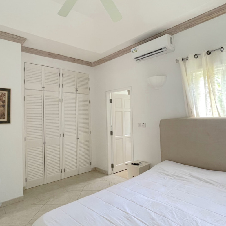 St Lucia real estate VILLAS ON THE GREEN 2 For Rent master bed