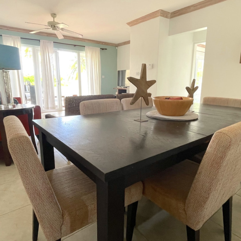 St Lucia real estate VILLAS ON THE GREEN 2 For Rent chairs table
