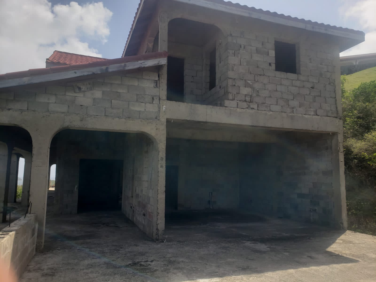 33381dfb-f7c7-4530-9e7e-615e0b0c30b9 Unfinished Villa For Sale in Cap Estate st lucia car port