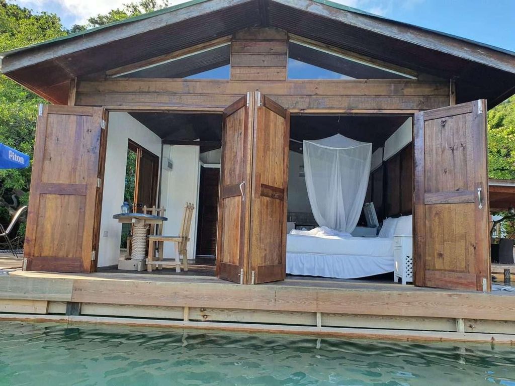 Mango Beach villa st lucia real estate marigot for sale dock cottage