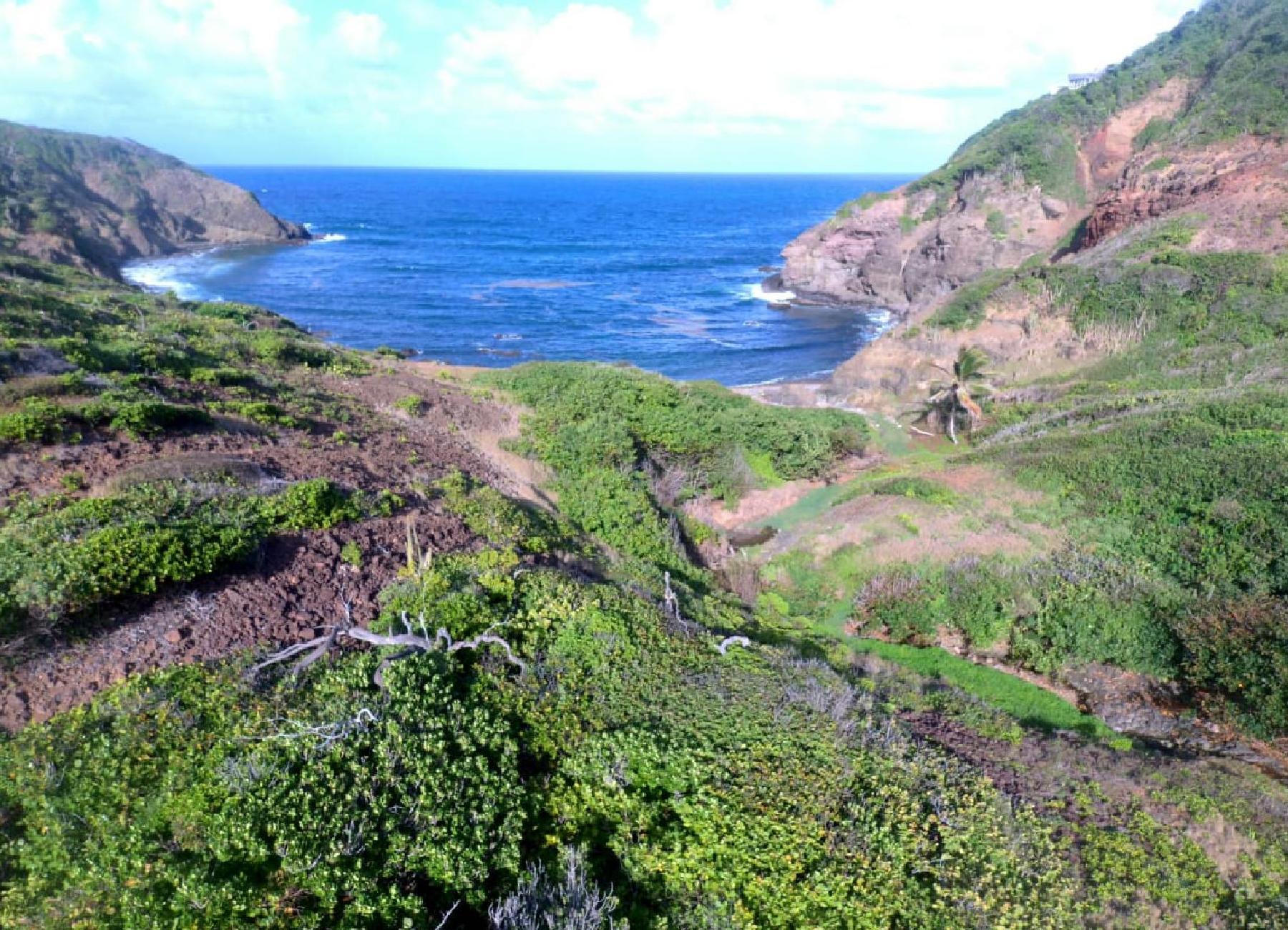 How much is 1 acre of land in St Lucia?