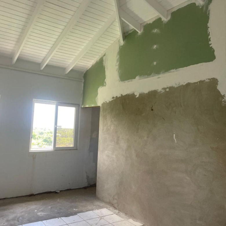 st lucia real estate : 4 Bed House For Sale In Vieux Fort sitting room