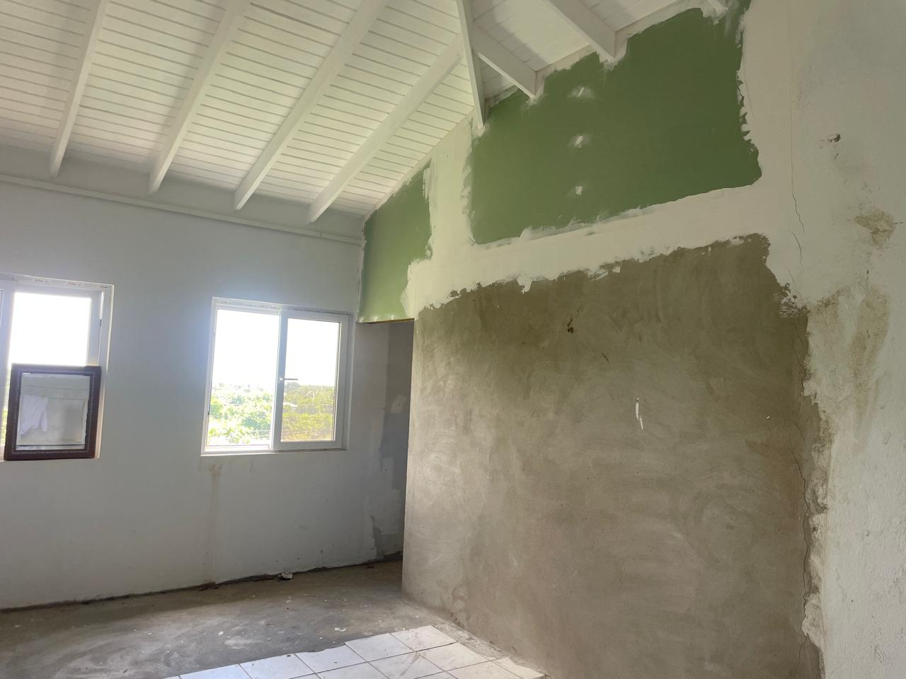 st lucia real estate : 4 Bed House For Sale In Vieux Fort sitting room