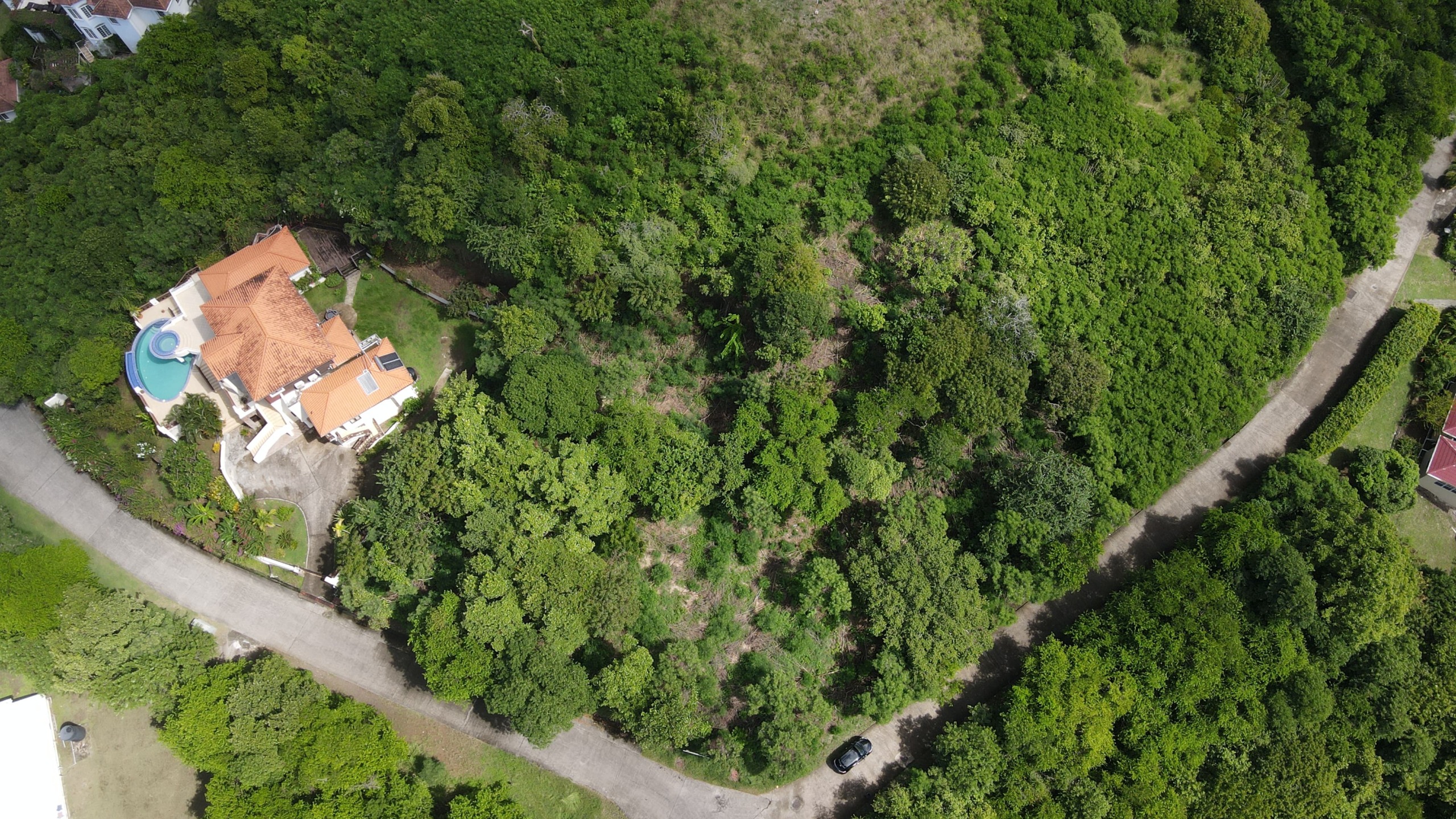 Own a lot with stunning golf course views in Mount Hardy, St. Lucia. Perfect for your dream home or luxury investment property.