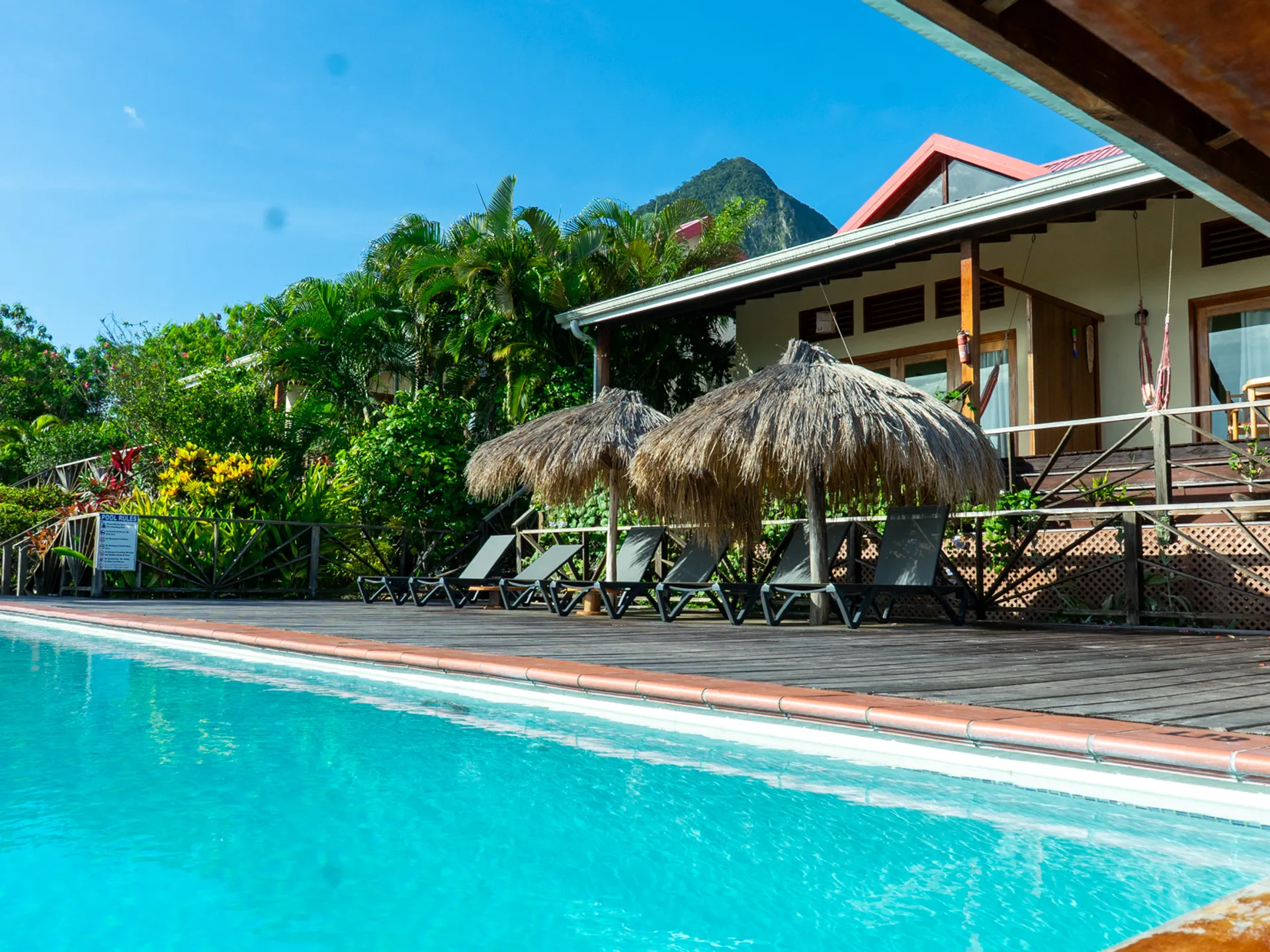 Saint Lucia Real Estate—Tet Rouge Resort | Realty St. Lucia front of villa pool