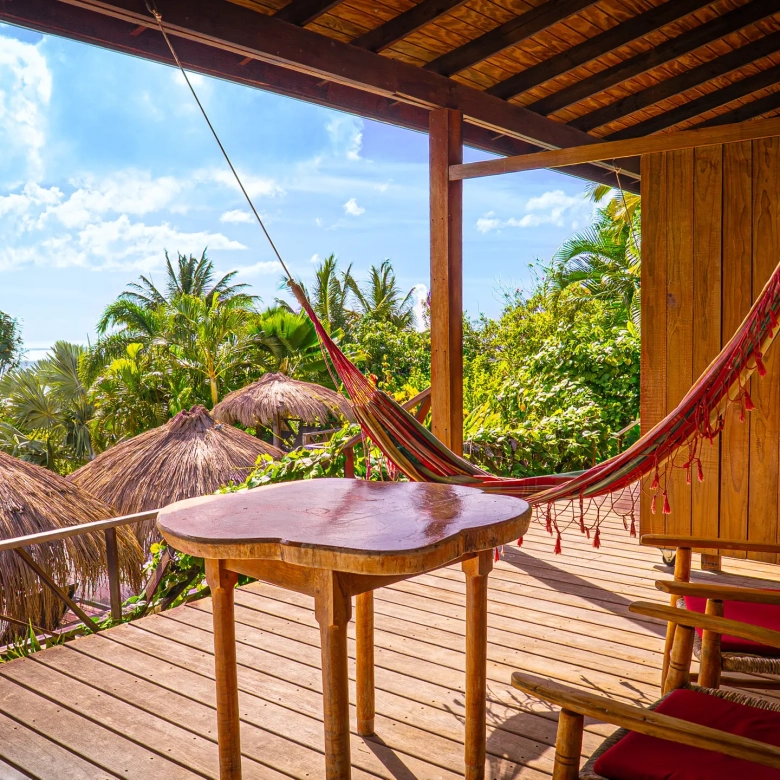 Saint Lucia Real Estate—Tet Rouge Resort | Realty St. Lucia table